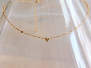 Ketting van edelstalen met 3 hartjes - goud