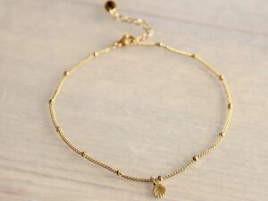 Fijn roestvrijstalen enkelbandje met mini schelp - goud